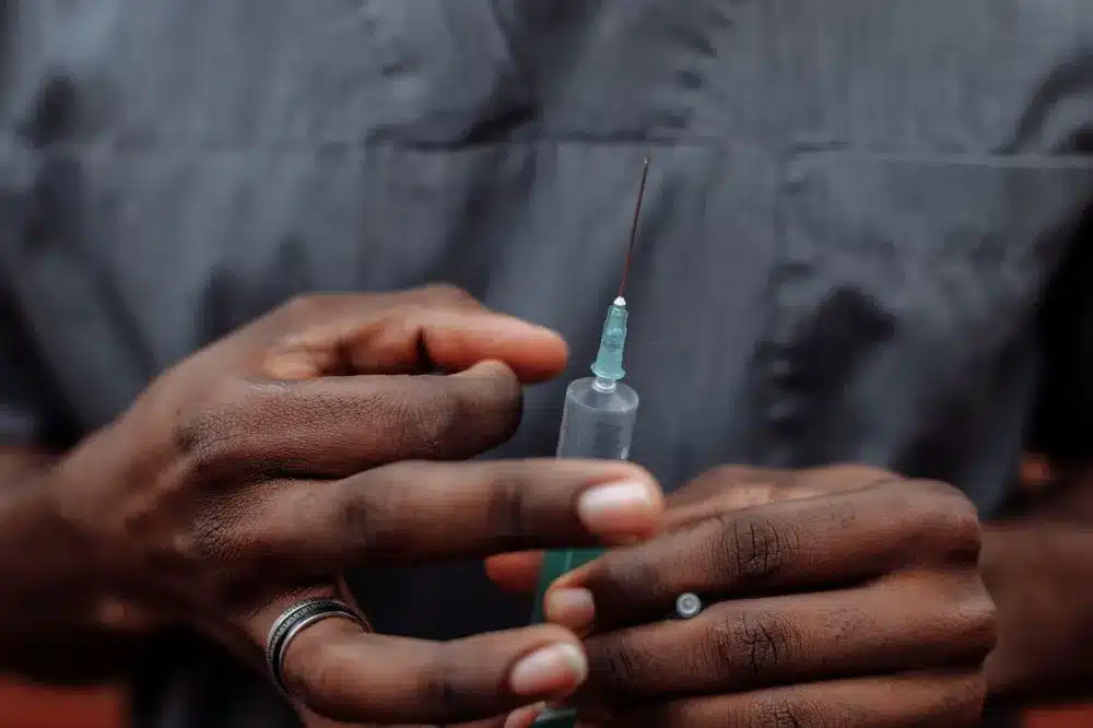 Physician administering precise therapeutic injection for chronic head and neck pain relief