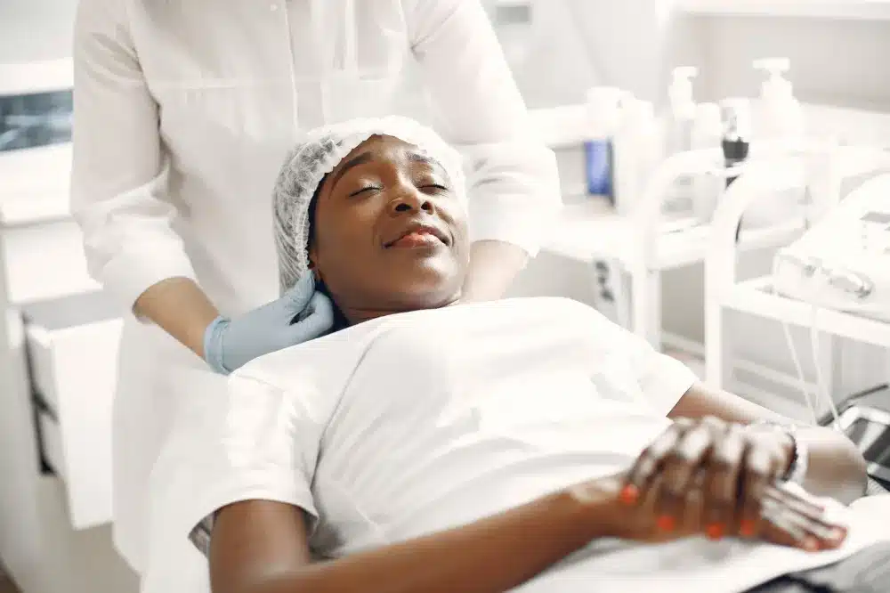 Patient resting comfortably after Botox therapy session at interventional pain management clinic