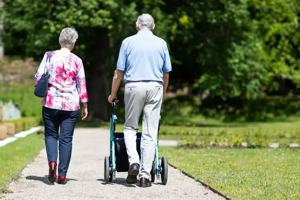 Senior adult walking outdoors after medication management helped reduce neuropathy discomfort in Grand Prairie