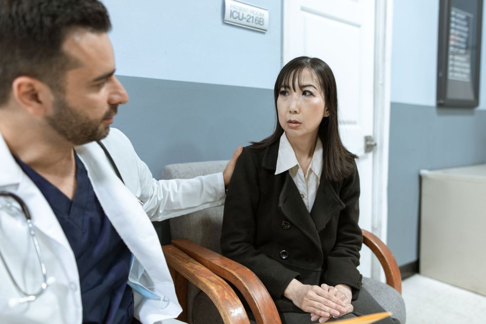 Melatonin & Botox for Chronic Migraines in Grand Prairie, TX 4 Patient relaxing in a modern pain management clinic waiting room before a consultation