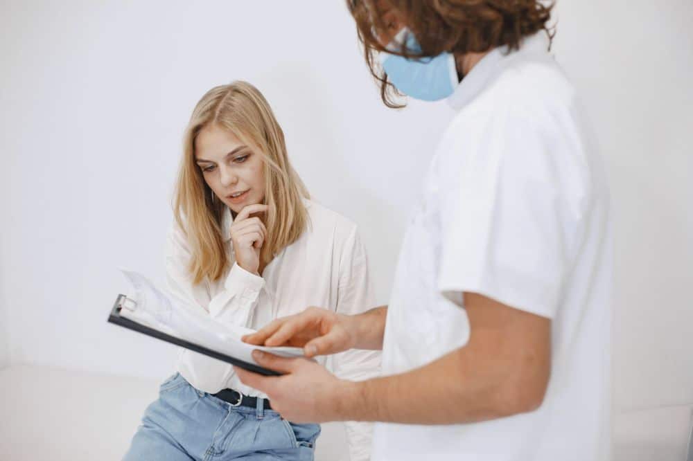 Patient scheduling a pain management consultation at a Texas spine and pain clinic