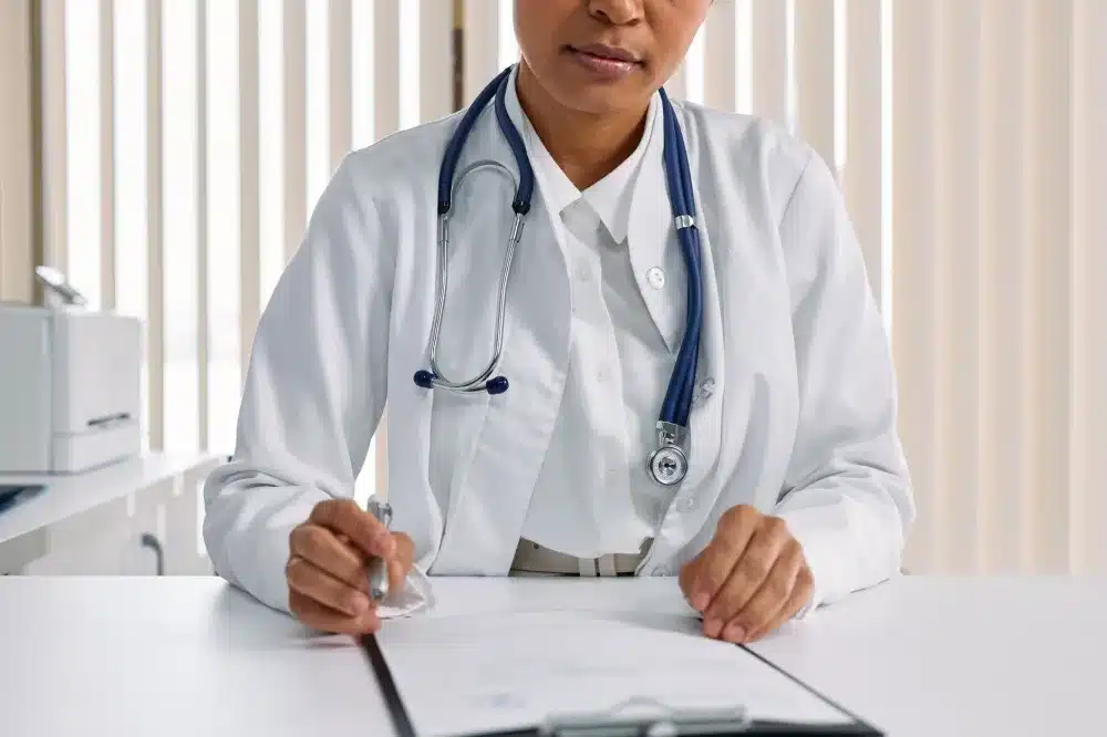 Shoulder Injection in Longview, TX | Non-Surgical Options 4 Interventional pain management specialist consulting with a patient about frozen shoulder treatment options