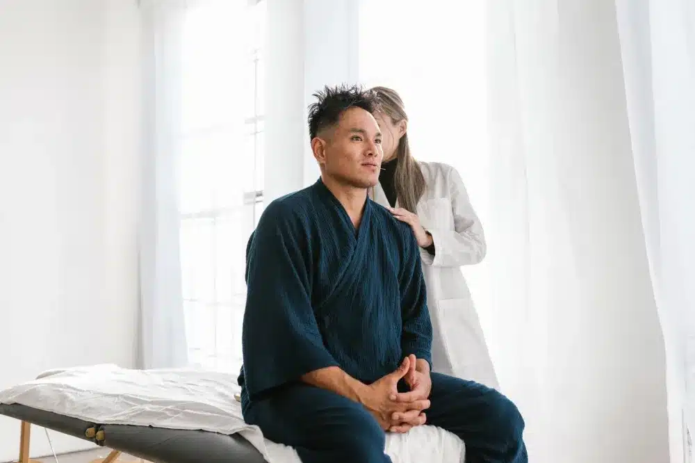 Pain management doctor consulting patient about CRPS nerve pain treatment options