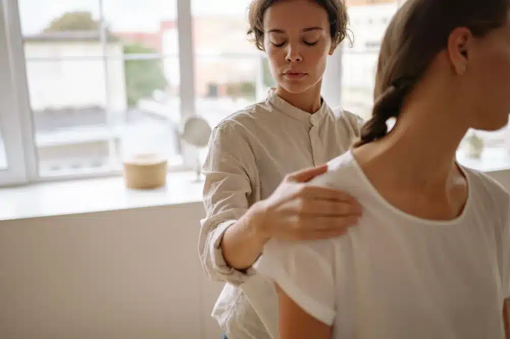Patient undergoing physical therapy as part of a multimodal CRPS pain management plan