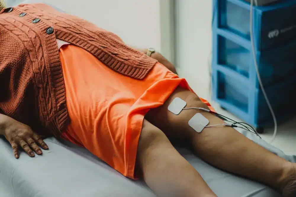 Person resting comfortably at home during spinal cord stimulator recovery period